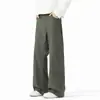 Calças casuais de corte justo e inclinado para homens e mulheres, com um moderno design de rebites, versáteis para o outono, caimento solto, tamanhos grandes, estilo high-street, calças de perna reta