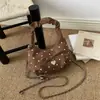Nova bolsa balde retrô minimalista, bolsa casual fashion, bolsa de ombro e transversal feminina texturizada nova do outono de 2026