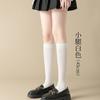 Calcetines de algodón para mujer calcetines finos calcetines de tubo de color sólido calcetines hasta la rodilla blanco negro venta directa de fábrica al por mayor