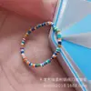 Pulseira Bohemian de Argolas Coloridas de Cerâmica Macia 4mm com Elástico Pulseira Fofa de Rosto Sorridente