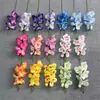 Pequeño ramo de flores artificiales de orquídea para bodas, decoraciones de flores artificiales de seda de alta gama, productos terminados para decoración de sala de estar, venta al por mayor