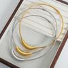 Collar magnético chapado en oro de acero de titanio con colgante curvo geométrico de personalidad minimalista con diseño de cadena de hueso de serpiente