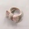 Libro rojo pequeño de Corea del Sur con simple anillo para el pelo de intestino grueso tocado para mujer 2024 nuevo anillo para el pelo de tela de alta elasticidad venta al por mayor