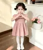 Vestido suéter para niña otoño e invierno nuevo estilo tejido de ochos falda corta vestido de punto para bebé niña estilo coreano dulce versátil Vestido de Año Nuevo