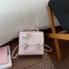 Mochila Novedad Primavera 2026 Estilo Coreano Nicho Linda con Relieve para Mujer, Bolso de Mano Versátil Ligero para Viajes