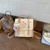 Mochila feminina de nicho da moda transfronteiriça 2026 nova bolsa de mão casual versátil para escola e bolsa transversal
