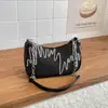 Bolsa de Ombro Feminina 2026 Modelo Novo Tendência Lantejoula Grande Capacidade com Zíper Moda Simples Texturizada Corrente para Comuteiro Sob o Braço para Mulheres