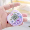 Máquina electrónica de mascotas mini de mano más vendida, máquina de juego de mascotas virtuales, llavero, colgante de regalo pequeño creativo