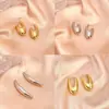 Pendientes Dorados Largos Ovalados Brillantes Estilo Europeo y Americano para Mujer, Set de Pendientes Sencillos de Alta Gama, Joyería para Orejas Versátil de Nicho al por Mayor