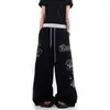 Pantalones de chándal anchos de estilo americano de alta costura, lavado claro con diseño de etiqueta estampado, cordón, unisex, holgados, casuales, largos