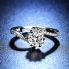 Anillo de diamante simulado con incrustaciones de circonita para mujer, con brazo de torsión cruzado, elegante y hermoso anillo de moissanita de 1 quilate con forma de corazón de melocotón y copo de nieve.