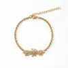 Nuevo brazalete de acero inoxidable estilo europeo y americano que no se decolora, moderno corazón, copo de nieve, trébol de cuatro hojas, perla colgante joyería para mujer