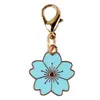 Venta Caliente Transfronteriza Aleación Esmalte Flor de Cerezo Colgante Broche Universal DIY Ropa Llavero Bolso Collar Pendientes Accesorios