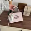 Bolsa de Mão de Nicho Estilo Coreano para Mulheres, Nova Moda 2026 Elegante Bolsa Quadrada Pequena de Ombro para o Dia a Dia e Uso Transversal