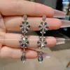 Brincos de Cristal em Forma de Gota com Cravação de Diamantes Personalizados para Mulheres, Estilo Europeu e Americano, Brincos Exagerados de Nicho, Acessórios de Orelha Exquisitos da Moda e Elegantes
