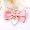 Nuevo Colgante Creativo de Cadena Colgante con Lazo de Perlas para Bolso, Funda de Teléfono, Llavero, Adorno, Exquisito Accesorio de Regalo Pequeño