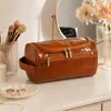 Bolsa de Higiene Pessoal de Couro PU de Alta Qualidade, Portátil, Grande Capacidade, Adequada para Viagens de Negócios, Viagens, Maquiagem e Armazenamento de Cuidados Pessoais para Homens e Mulheres