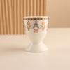 Suministro directo creativa transfronteriza portahuevos taza de vino pequeña de cerámica taza de huevo alta mini taza de vino juego estilo Medio Oriente