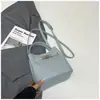 Bolso Cubo de Mano de Nicho Estilo Coreano para Mujer 2026 Primavera Nuevo Moda Bolso de Hombro Único Bolso Cruzado Simple de Alto Valor