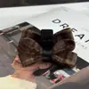 Pinza para el cabello de estilo británico a cuadros retro nuevo coreano y japonés con lazo para la frente lateral Elegante Versátil Pasador