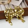 Pendientes pesados de lentejuelas con borlas de temperamento de moda europea y americana, atmósfera transfronteriza, alto sentido, viento frío, accesorios para el cabello de metal al por mayor