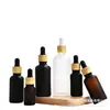En Stock Botella de Vidrio Esmerilado Marrón con Gotero de Silicona para Aceite Esencial con Tapa 30ml Grano de Madera de Imitación Botella Vacía Rellenable para Cosméticos