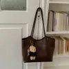 Bolso Retro de Gran Capacidad para Mujer 2026 Nuevo Bolso de Hombro Individual Casual para el Trabajo y el Viaje Bolso Tote de Mano con Textura Simple