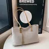 Bolsa Tote de Tecido Tricô Retro para o Dia a Dia com Alça Única 2026 Nova Coleção Primavera Grande Capacidade Simples e Estilosa
