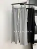 Pantalones Casuales de Ajuste Relajado para Mujer con Dobladillo Deshilachado, Cordón, Cintura Estrecha Elástica, Largo Nueve Puntos, Colección Primavera/Verano/Otoño/Invierno 2026