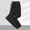 Pantalones casuales de otoño transfronterizos para hombre, corte holgado extragrande, estilo jogger versátil, cómodos para el trabajo y el deporte, pantalones largos