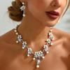 Elegante joyería de gota de agua atmosférica transfronteriza europea y americana, elegantes pendientes de perlas redondas geométricas con flores, collar, traje de mujer
