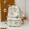 Nova Mochila de Grande Capacidade com Borboleta Moda Casual Versátil para Homens e Mulheres Mochila para Estudantes do Ensino Médio Bolsa para Estudantes de Campus Venda por Atacado