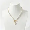 Cadena de Perlas Oceánicas de Venta Caliente Transfronteriza Europea y Americana Cadena para Clavícula de Mujer Colgante de Estrella de Mar y Concha Collar Multicapa Apilable Venta al por Mayor