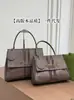 2026 Nuevo Modelo Transfronterizo Original de Cuero Bolsa con Cerradura Bolsa de Compras Estampada Bolso Tote con Cadena para Hombro Cruzado