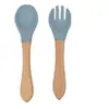 Conjunto Colher Garfo de Silicone Baby Dumo com Cabo de Madeira Macio Resistente a Quedas Colher Garfo para Alimentação Infantil Utensílio de Cozinha para Bebê Colher Garfo Suplementar para Alimentos