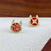 Estilo antiguo estilo chino carácter FU rojo cuerno de dragón aretes temperamento femenino lujo ligero nueva celebración moda todo partido aretes para oreja de dama aretes