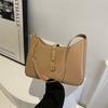 Bolso de diseño de nicho de estilo coreano para mujer, nuevo bolso de hombro de moda versátil y portátil con textura para invierno de 2023 para mujer.