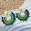 Pendientes Europeos y Americanos de Estilo Étnico con Cuentas en Forma de Abanico para Mujer, Pendientes Bohemios Tejidos a Mano con Cuentas de Arroz, Estilo Caliente de Amazon
