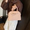 Bolso tejido con costuras de nicho para mujer, moda vintage versátil, de un hombro, para llevar bajo el brazo, nuevo estilo 2025, estilo occidental, bandolera
