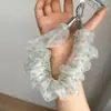 Coleção~Elásticos de cabelo populares, scrunchies, cordões de pulso, pingentes de bolsa multiuso, chaveiros, alças de celular