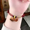 Pulsera de Hilo Rojo con Huesos de Durazno para la Buena Suerte en el Año Zodiacal de Uno, Adecuada para Hombres, Mujeres, Bebés y Niños, Tejida para Protección Contra el Miedo, Hecha de Madera de Durazno Vieja