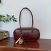 Bolsa Tote Bowling Retrô Simples Feminina Primavera 2026 Nova Casual Bolsa Almofada para o Trabalho Ombro Único Bolsa de Axila