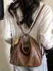 Mochila casual de gran capacidad para mujer 2026 nueva mochila para el trabajo bolsa de hombro cruzada de color liso elegante