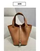 2025 Nueva Bolsa Cesta de Verduras Primera Capa Patrón de Lichi Piel de Vaca Tendencia de Moda Gran Capacidad Estilo Casual Bolso Cubo Portátil