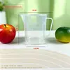 Taza medidora de plástico con tapa y escala en stock, especializada para tiendas de té de burbujas, jarra medidora doméstica de grado alimenticio, resistente a altas temperaturas