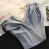Venta al por mayor transfronteriza de pantalones casuales nuevos para hombre de primavera y otoño, jeans clásicos vintage de color liso, cintura elástica simple