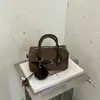Elegante bolso de bolos de bloques de color de alta calidad para mujer, un bolso de hombro que también se puede llevar cruzado, nuevo bolso tote casual y elegante otoño 2026