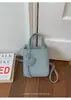 Bolsos de Diseño de Nicho para Mujer 2026 Nuevo Bolso Cruzado Versátil de Verano Bolso de Mano Súper Popular Bolso Cuadrado Pequeño para el Trabajo