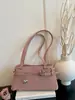 Coleção nova de 2026: bolsa pingente em formato de estrela, uma bolsa de mão elegante e sofisticada para mulheres, uma bolsa de ombro versátil e uma bolsa prática para o dia a dia