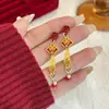 Nuevos Pendientes Largos con Borlas Estilo Chino para Mujer, Lujosos Pequeños Dioses de la Riqueza Esmalte Vintage Artístico Patrón de Nube Bolsas de la Suerte Pendientes para Mujer